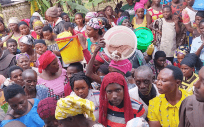 Friars distribute help to flood victims amidst talks on care and protection of the environment in Rwanda